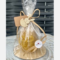 Stor P�ske�g dekoreret med en sl�jfe / P�skepynt  i Bivoks - H�ndlavet og b�redygtigt lys